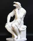 Photo of a sculpture of Lorenzo de Medici on a black background