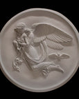 photo of plaster cast relief of woman with wings flying with two children nestled against her and an owl flying on a dark background
