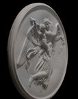 photo of plaster cast relief of female with wings flying and a cherub on her back on black background