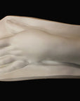 Photo of a plaster cast of a female hand