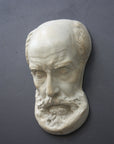 Photo of a sculpture of a St Jermone head on a gray background