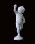 Photo of a sculpture of a cherub on a black background