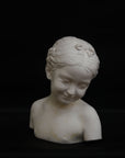 A photo of a sculpture of a Florentine girl on a black background
