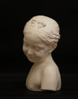 A photo of a sculpture of a Florentine girl on a black background