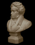 photo of plaster cast sculpture of male bust of Ludwig van Beethoven in dress coat and ruffled necktie on black background