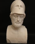 Photo of male sculpture with beard and helmet on a black background