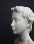 Photo of s sculpture of st john on a grey background