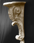 image of a plaster renaissance bracket on a gray background
