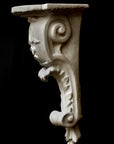 image of a plaster renaissance bracket on a black background