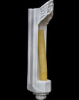 image of a plaster gothic sconce with candlestick on a black background