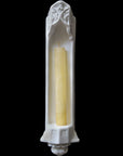 image of a plaster gothic sconce with candlestick on a black background