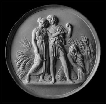 black and white photo of white plaster cast relief sculpture of male and female figures walking through field of wheat and a female figure kneeling in the field cutting wheat against black background