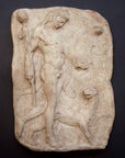 photo of yellow-colored plaster cast relief sculpture of satyr with animal skin over his arm and staff in one hand walking beside a panther against gray background