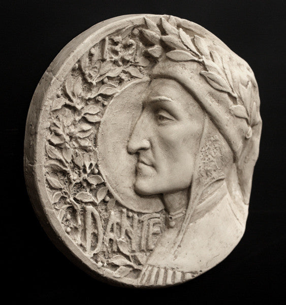 photo of plaster cast of small medallion with male portrait, namely Dante Alighieri, in profile and floral decoration on the left side curve and the word Dante, on black background