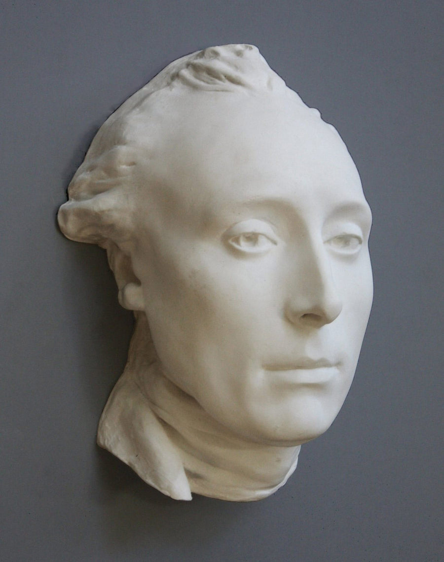 photo with gray background of plaster cast of male face, namely Lafayette, with neckerchief