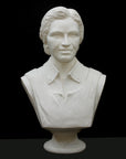 Photo of plaster cast of sculpture bust of Rosa Parks on a black background