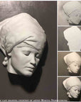 A monochrome drawing of a plaster cast of a Nubian female mask showing four progress steps on the right and the finished drawing on the left