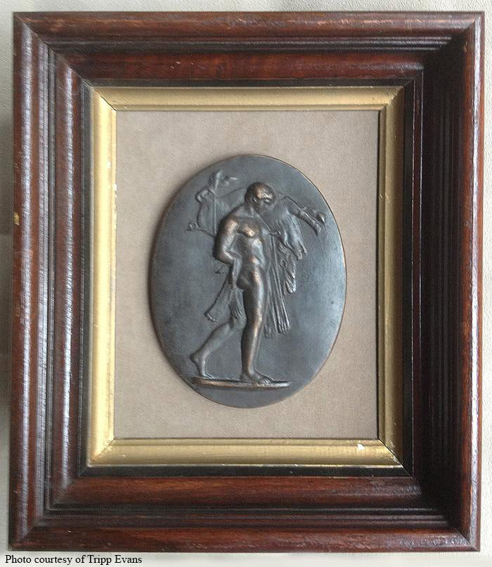 Image of a small faux-bronze plaque of Hercules carrying a boar in a wooden picture frame