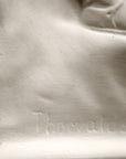 photo of plaster cast sculpture relief showing artist inscribed signature