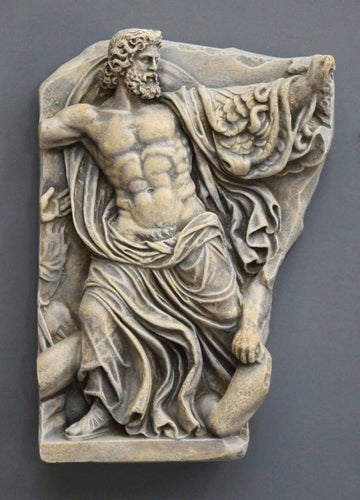 photo of plaster cast relief fragment of man, namely the god Zeus, on a gray background