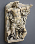 photo of plaster cast relief fragment of man, namely the god Zeus, on a gray background