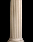 photo of white plaster cast pedestal in the Doric style with a fluted column against a black background