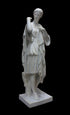 photo of white plaster cast of female figure, namely the goddess Diana, in robes about to clasp two pieces together at proper right shoulder, against black background