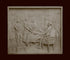 photo of off-white plaster cast relief sculpture of men around a table aka signing the Declaration of Independence, on black background