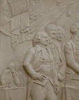 detail photo of off-white plaster cast relief sculpture of men around a table aka signing the Declaration of Independence