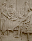 detail photo of off-white plaster cast relief sculpture of men around a table aka signing the Declaration of Independence