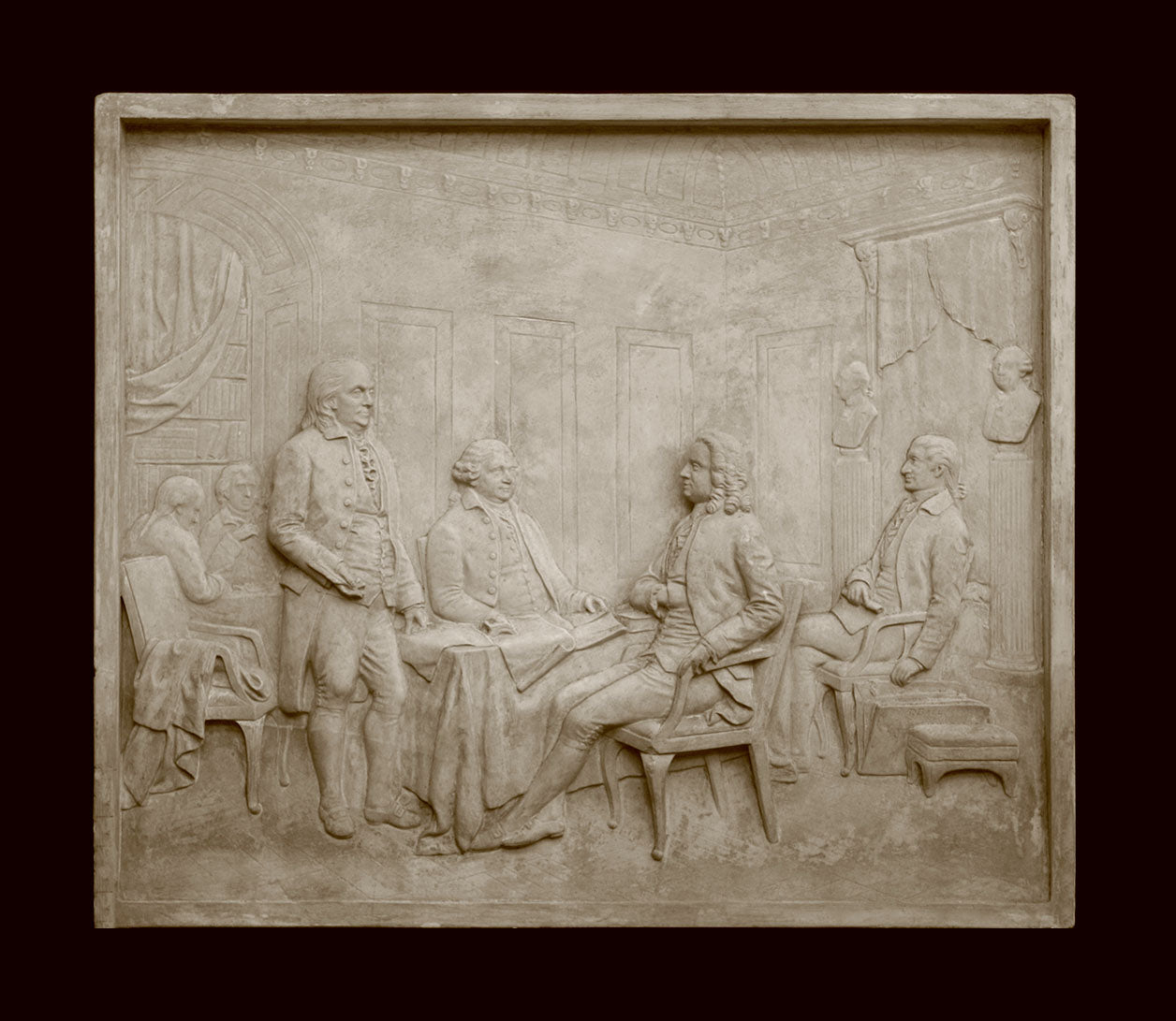 photo of off-white plaster cast relief sculpture of four men around a table aka signing the Treaty of Peace and Independence