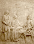 detail photo of off-white plaster cast relief sculpture of four men around a table aka signing the Treaty of Peace and Independence