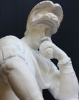 Photo of a sculpture of Lorenzo de Medici on a black background