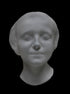 Photo of the mask of La Belle Italienne in white plaster on a black background