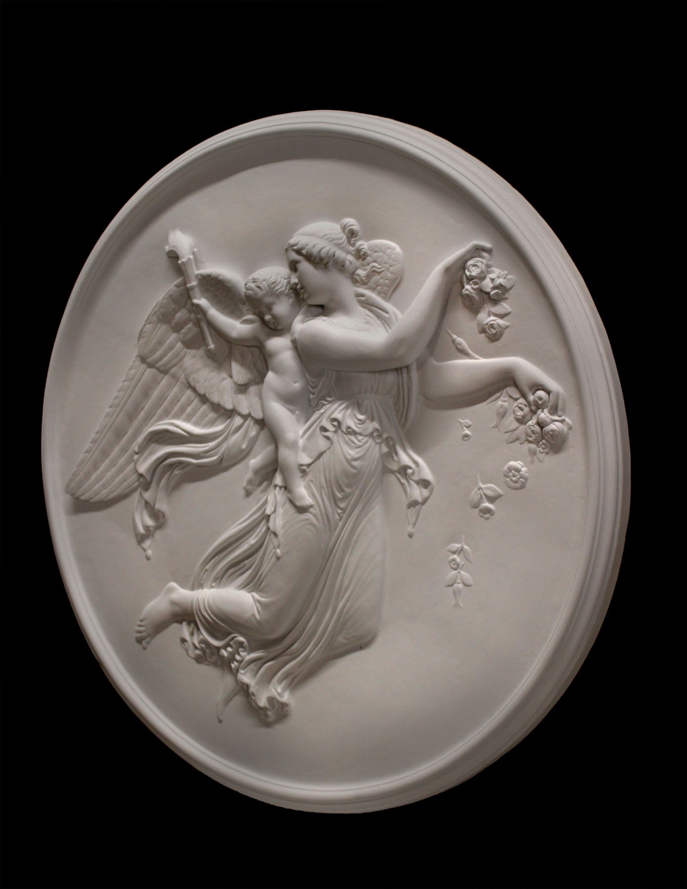  photo of plaster cast relief of female with wings flying and a cherub on her back on black background