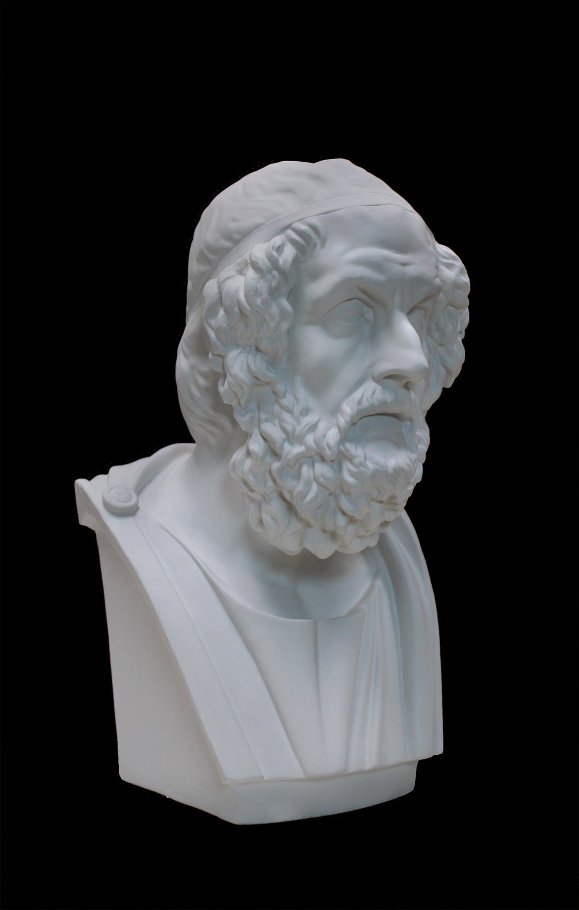 image of a plaster statue of a bust of homer on a black background