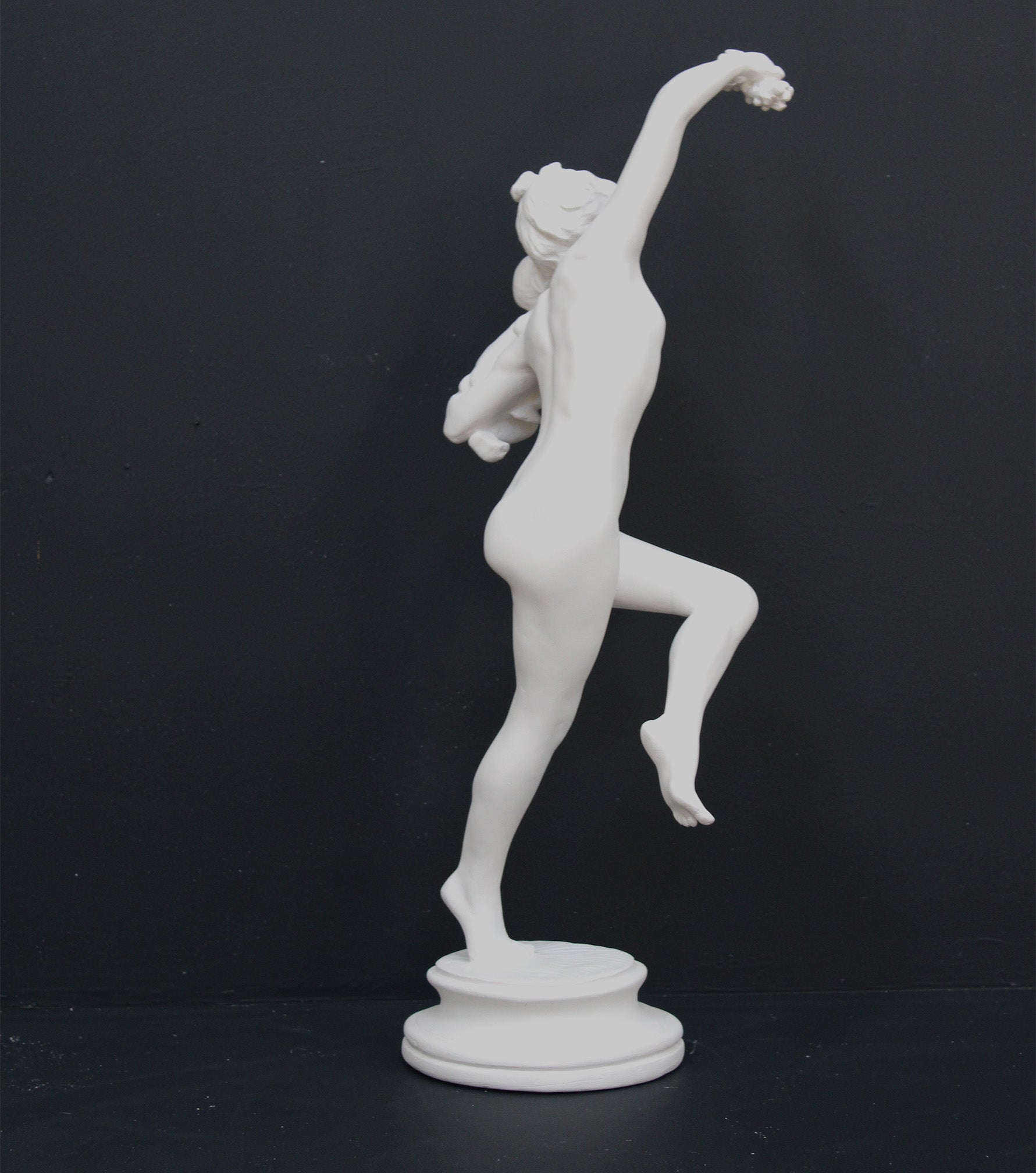 Photo of a dancing lady and baby on a black background
