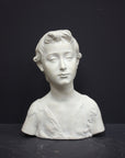 Photo of s sculpture of st john on a grey background 