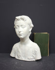 Photo of s sculpture of st john on a grey background 
