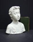 Photo of s sculpture of st john on a grey background 