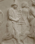 Photo of a sculpture of a marching band on a black background