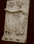 Photo of a sculpture of Cantoria Singers on a black background