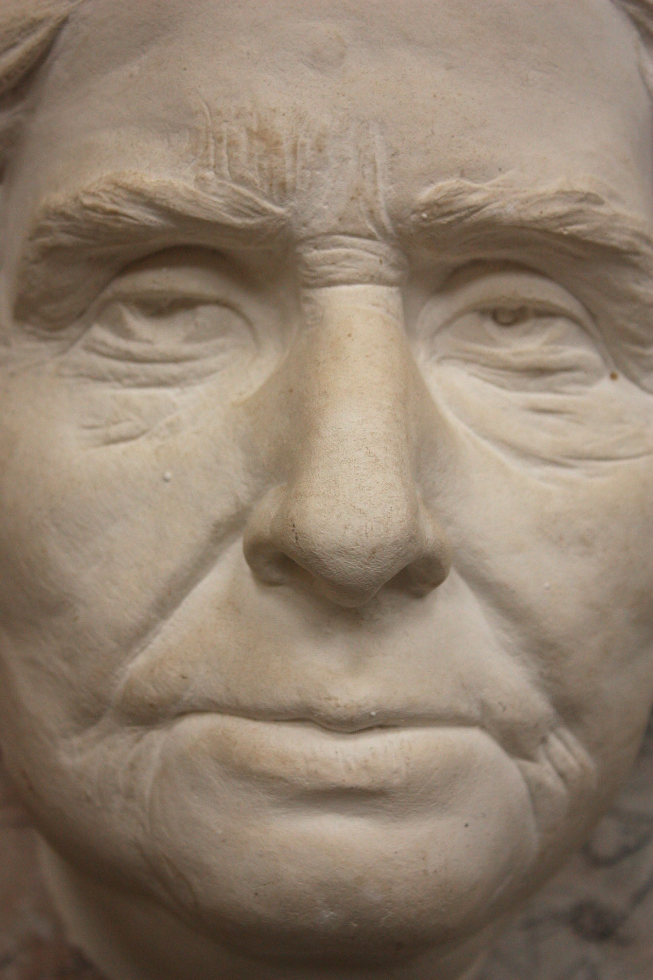 Photo of a portrait of a old lady on a black background