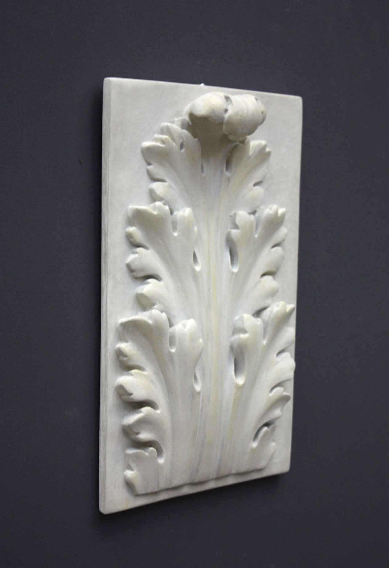 Photo of a decorative sculpture on a black background 