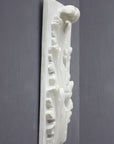 Photo of a decorative sculpture on a black background 