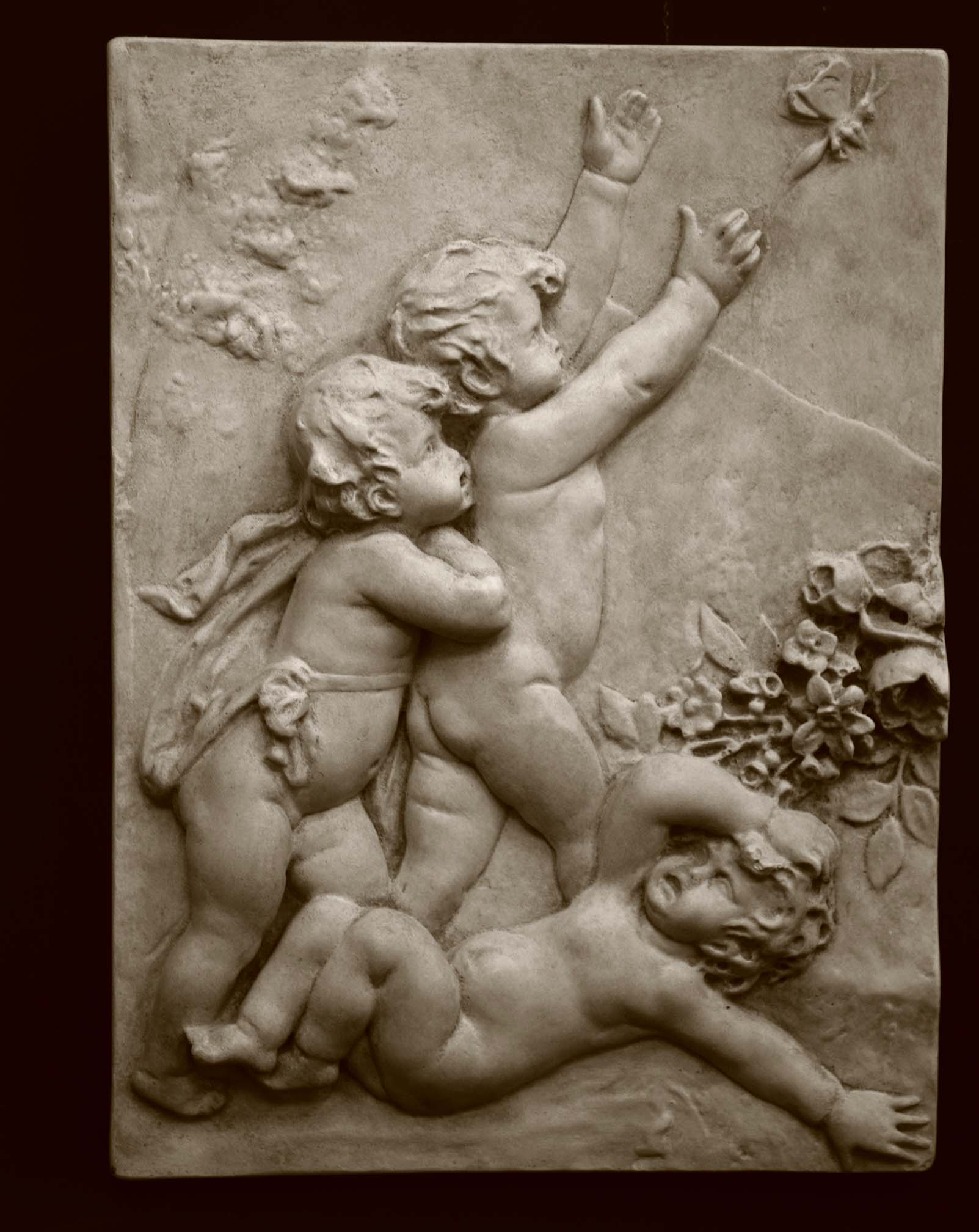 Photo of cupids on a black background