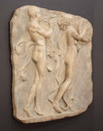 Photo of sculpture of 2 figures marching with musical instruments on a black background
