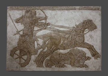 photo of plaster cast of ancient relief of two men in a chariot pulled by three horses and a wounded lion under their legs on a gray background