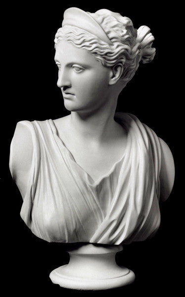 Photo with black background of white plaster cast of sculpture bust of female goddess Diana with drapery and crown and up-do
