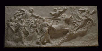 photo of a plaster cast sculpture relief of a woman, namely the goddess Aurora, flying and leading a chariot with a man pulled by horses towards the right while a cherub and other women fill the scene, on a black background